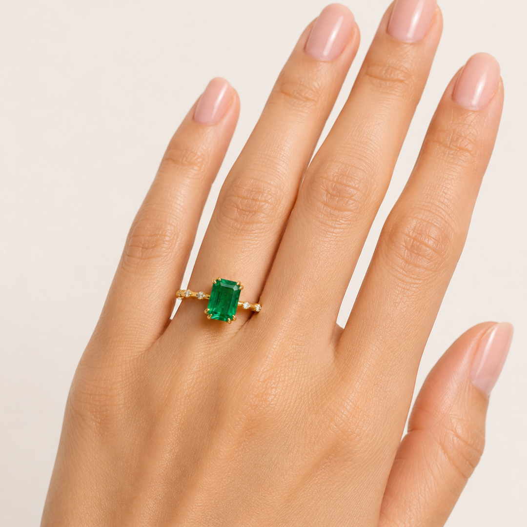 Zambian Emerald Claw Set Diamond Ring